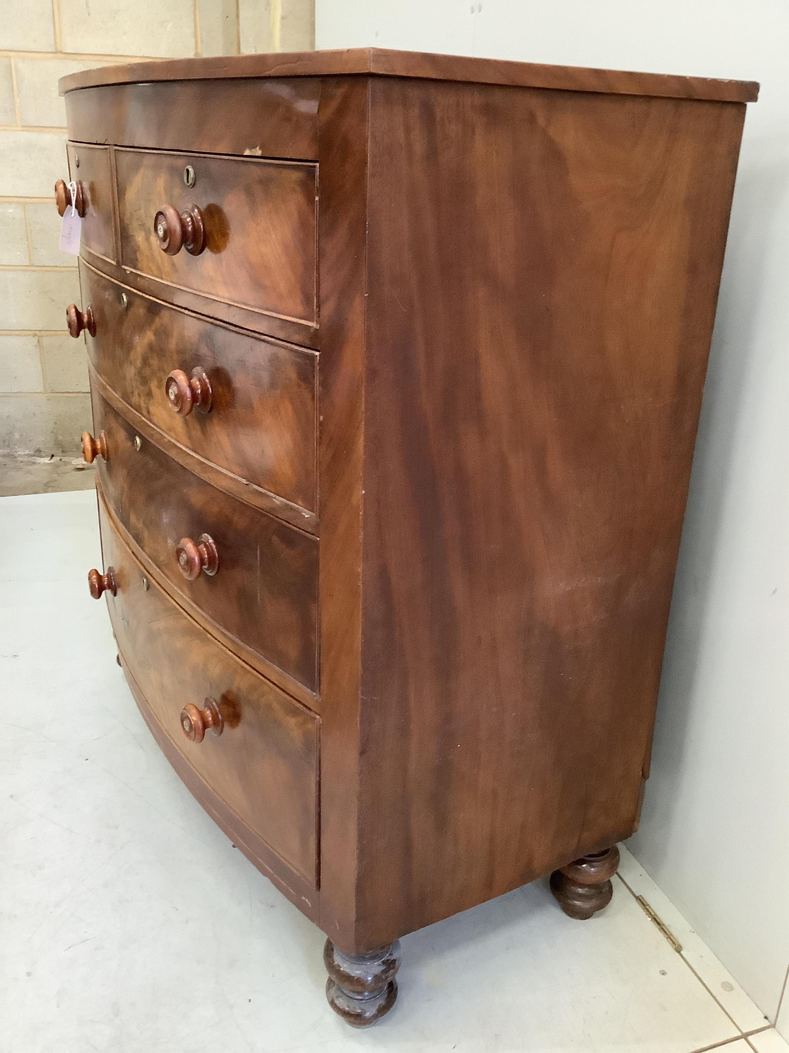 A Victorian mahogany bow front chest, (feet are loose), width 114cm, depth 55cm, height 118cm